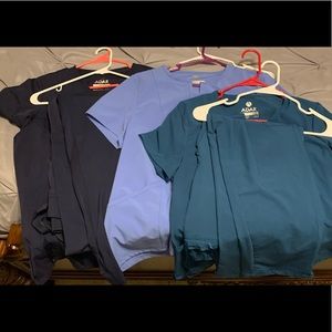 Never worn - Adar scrub sets.  Size large. Green and sky blue left.